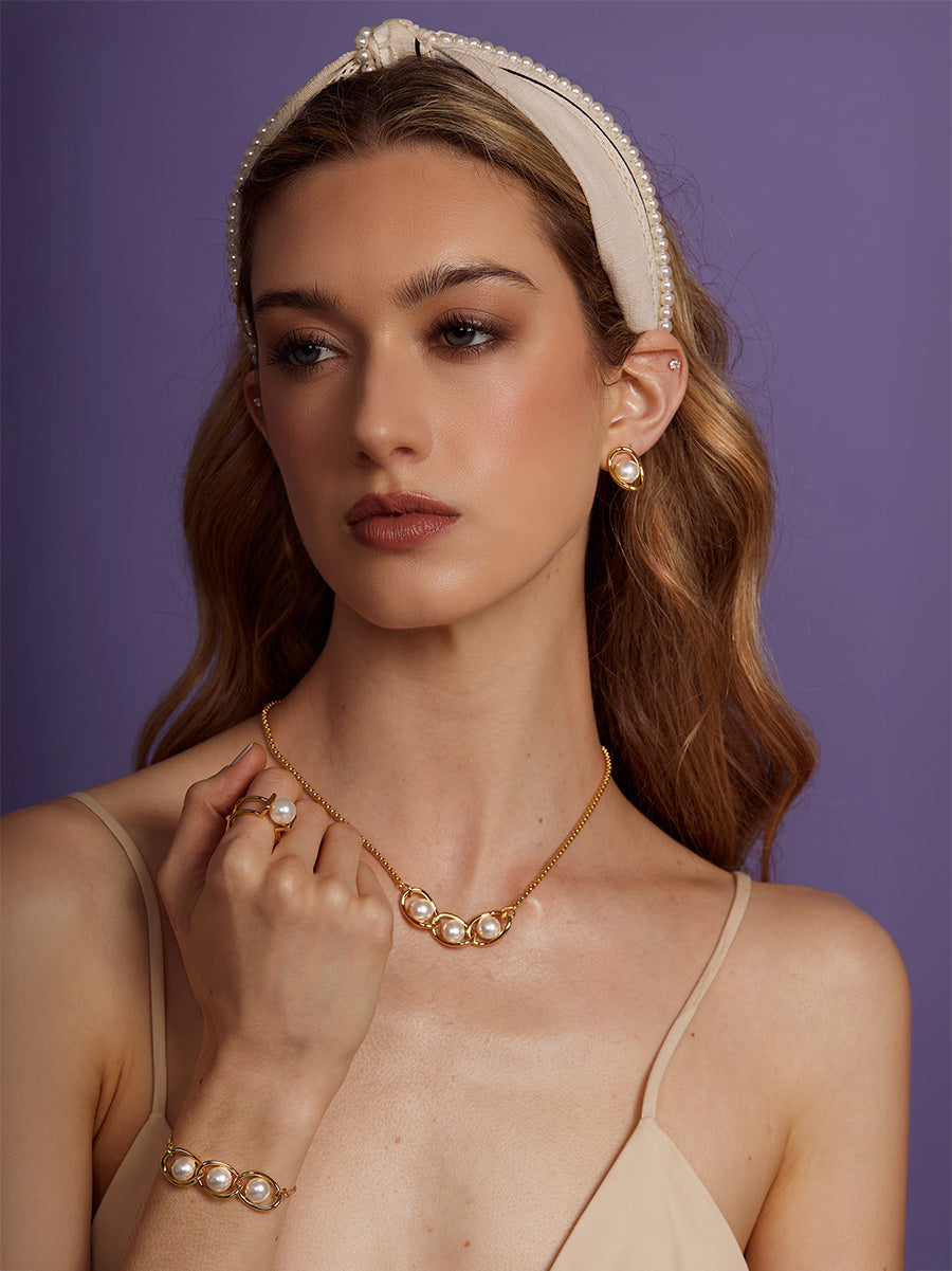 Twisted Orbit Pearl Necklace