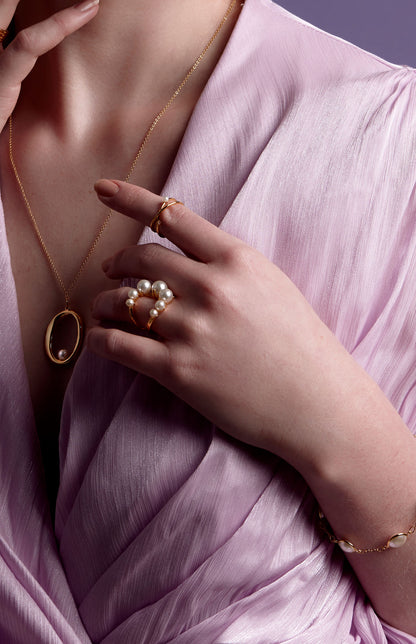 Adjustable Assymetric Pearl and Crystal Crossover Ring